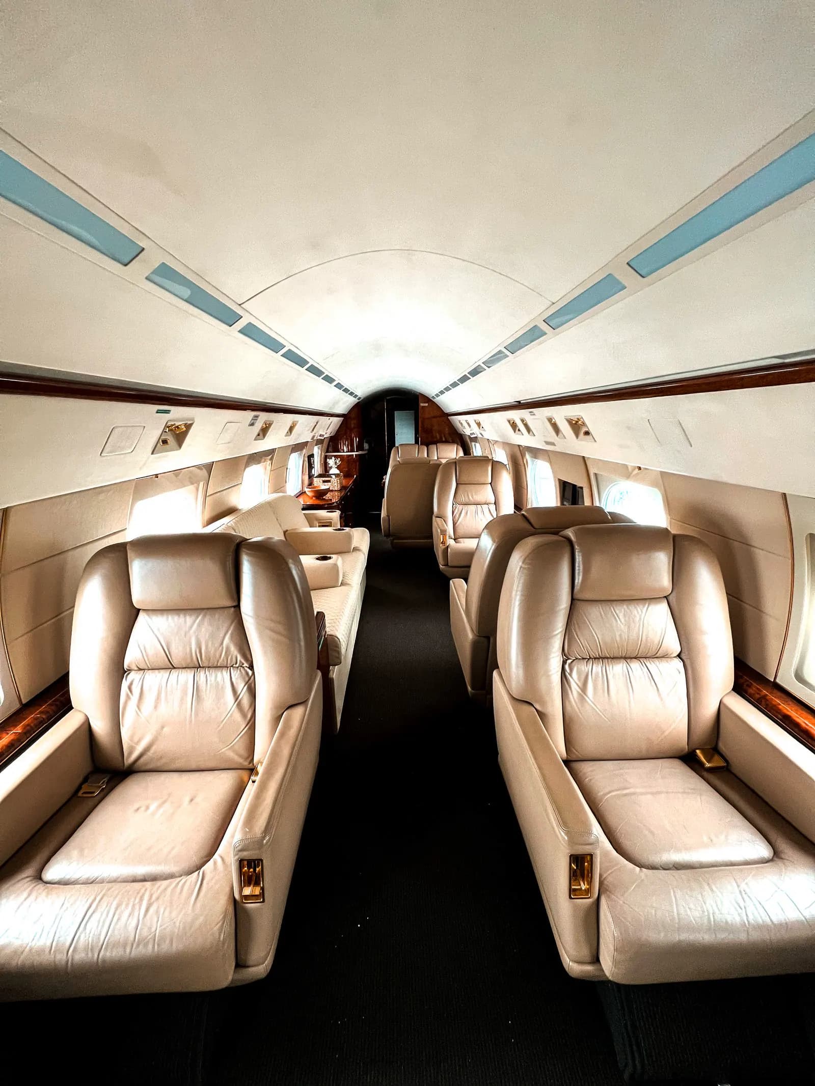 Quiet ultra-long-range cabin interior — the class of travel, not an owned aircraft.